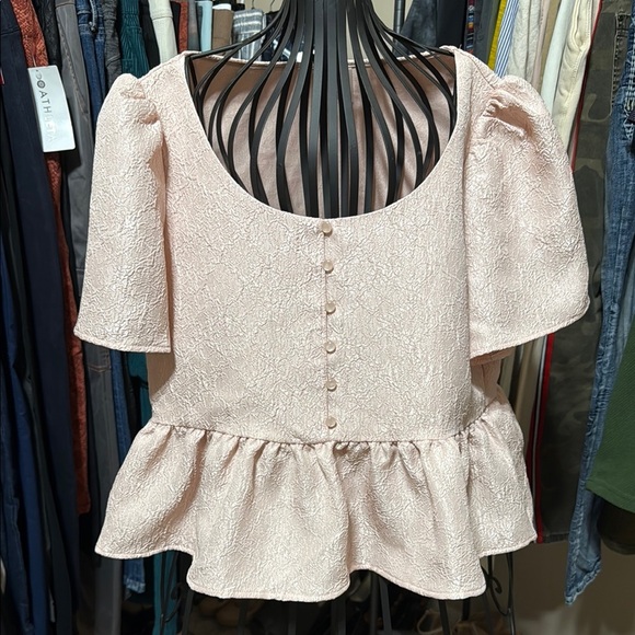 DIVIDED Elegant Pink Textured Top With Ruffled Bottom - Picture 1 of 4